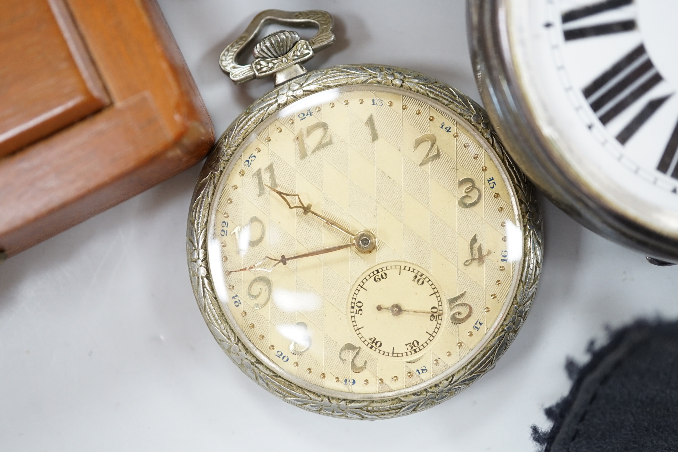 Ten assorted base metal pocket watches including two Goliath one by Bishop of Bournemouth.